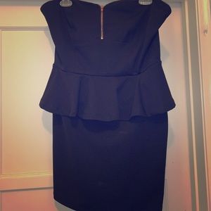 Strapless midi dress with peplum top.